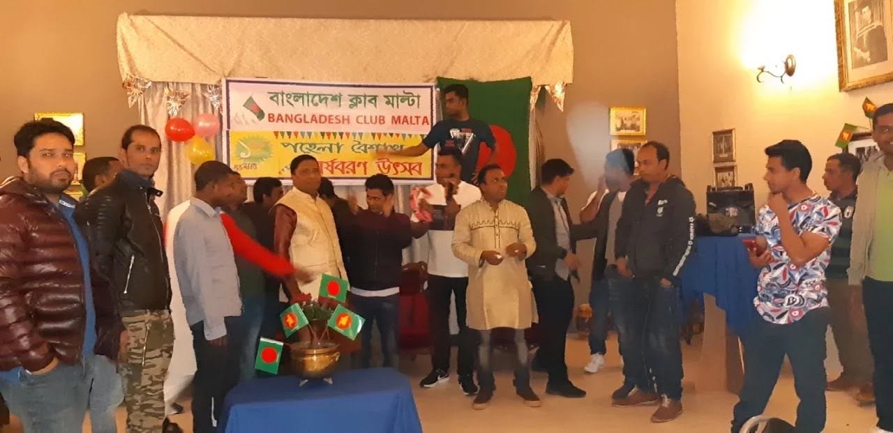 Pohela Boishakh celebration with Bangladeshi flags, music and community members welcoming the Bengali new year